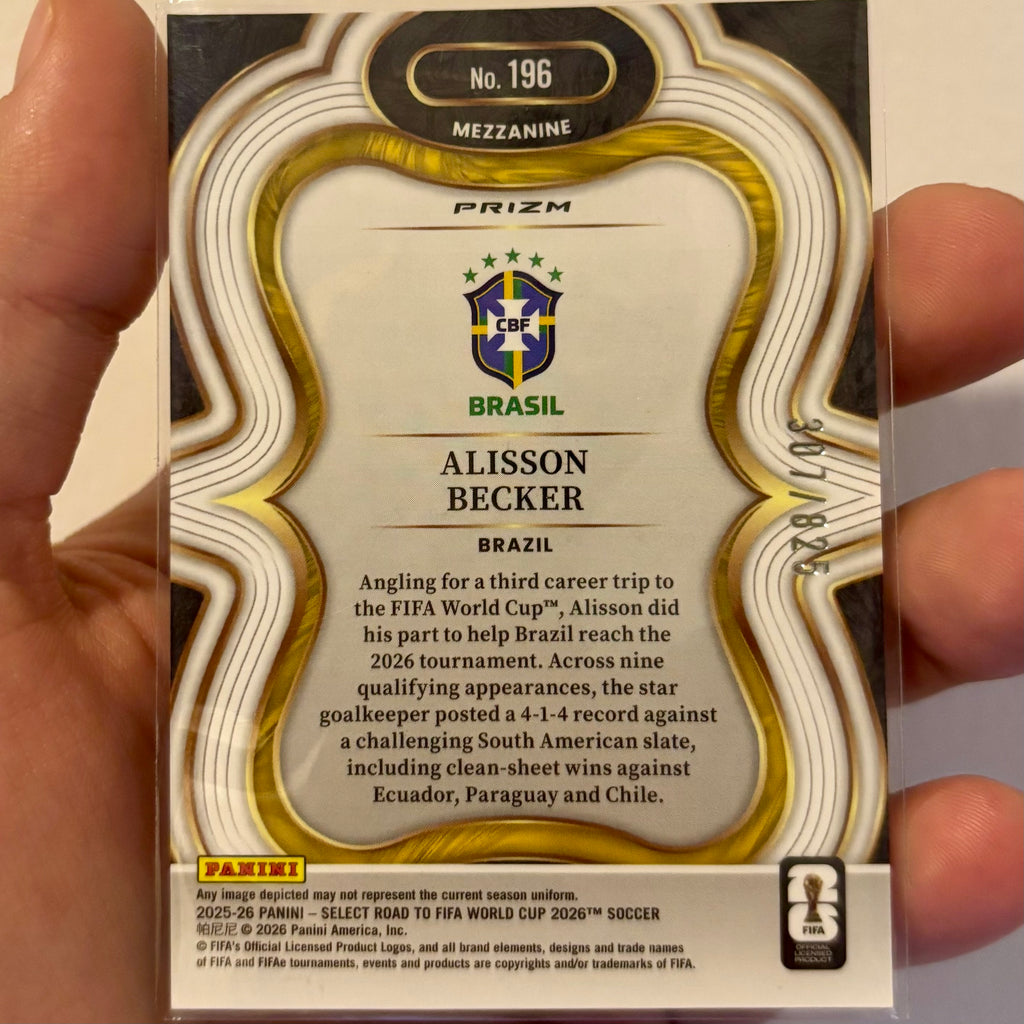 Alisson Becker #196 Orange Mojo Prizm 307/825 – Panini Select 2025-26