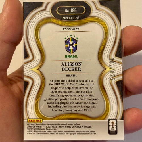 Alisson Becker #196 Orange Mojo Prizm 307/825 – Panini Select 2025-26